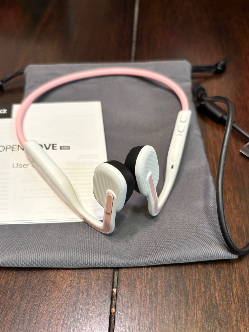 Shokz OpenMove Headphones in White and Pink